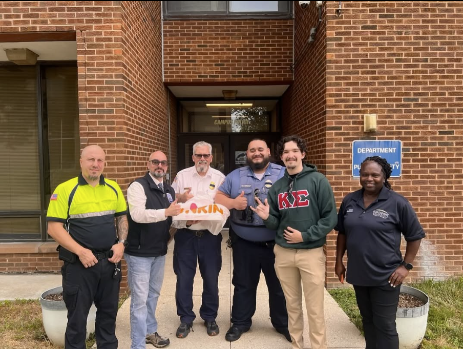Brother Ari giving Department of Public Safety donuts for First Responders' Day